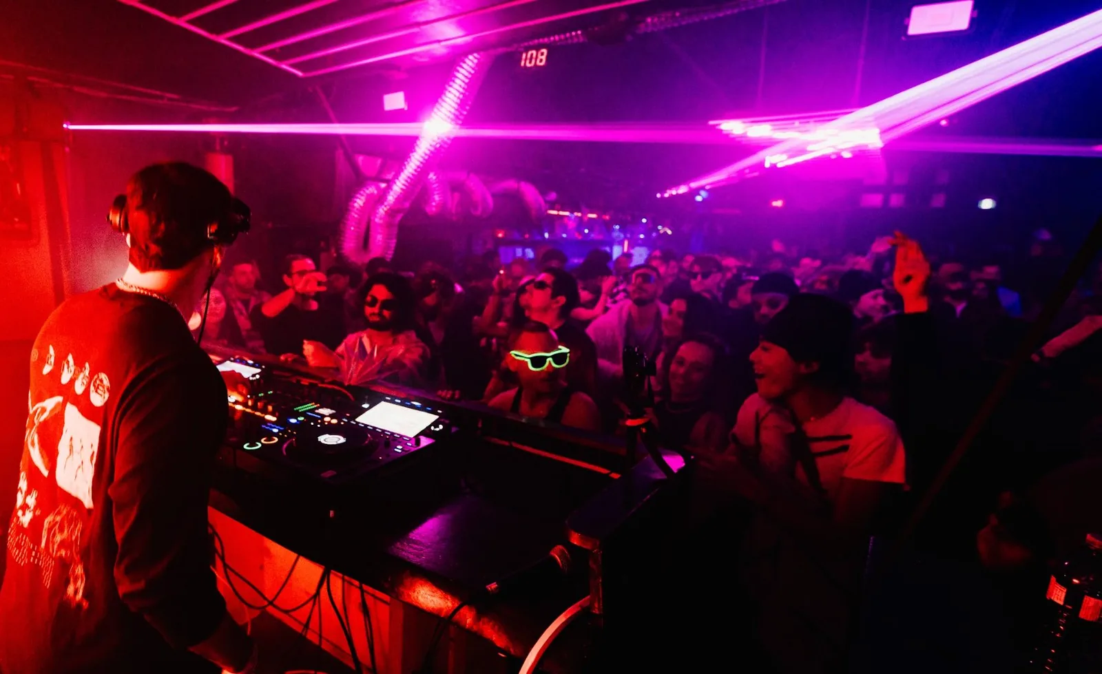 RSN8 night, DJ and crowd under pink lasers, Toronto